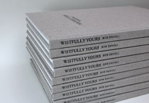 Stack of Wistfully Yours bindings.