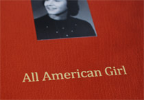 Closeup of front cover of All American Girl bindings.