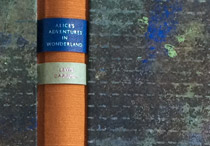 Front cover of Alice's Adventures in Wonderland binding.