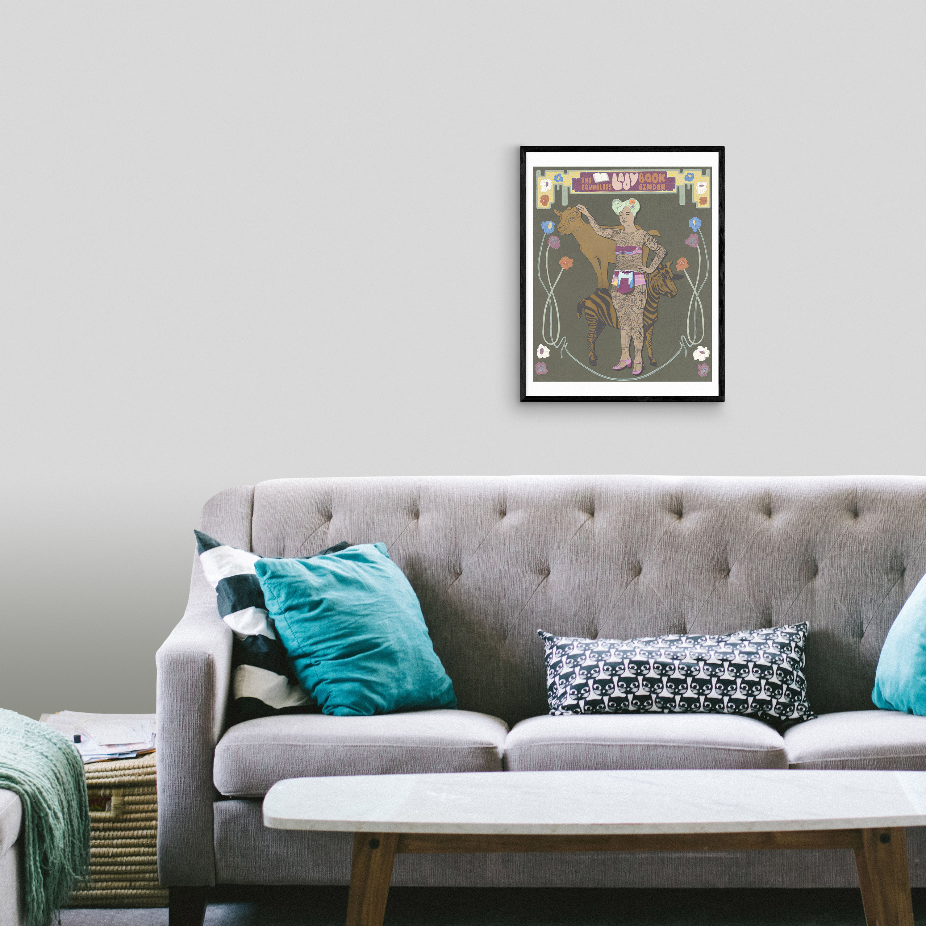 Living room with The Boundless Lady Bookbinder print on the wall.