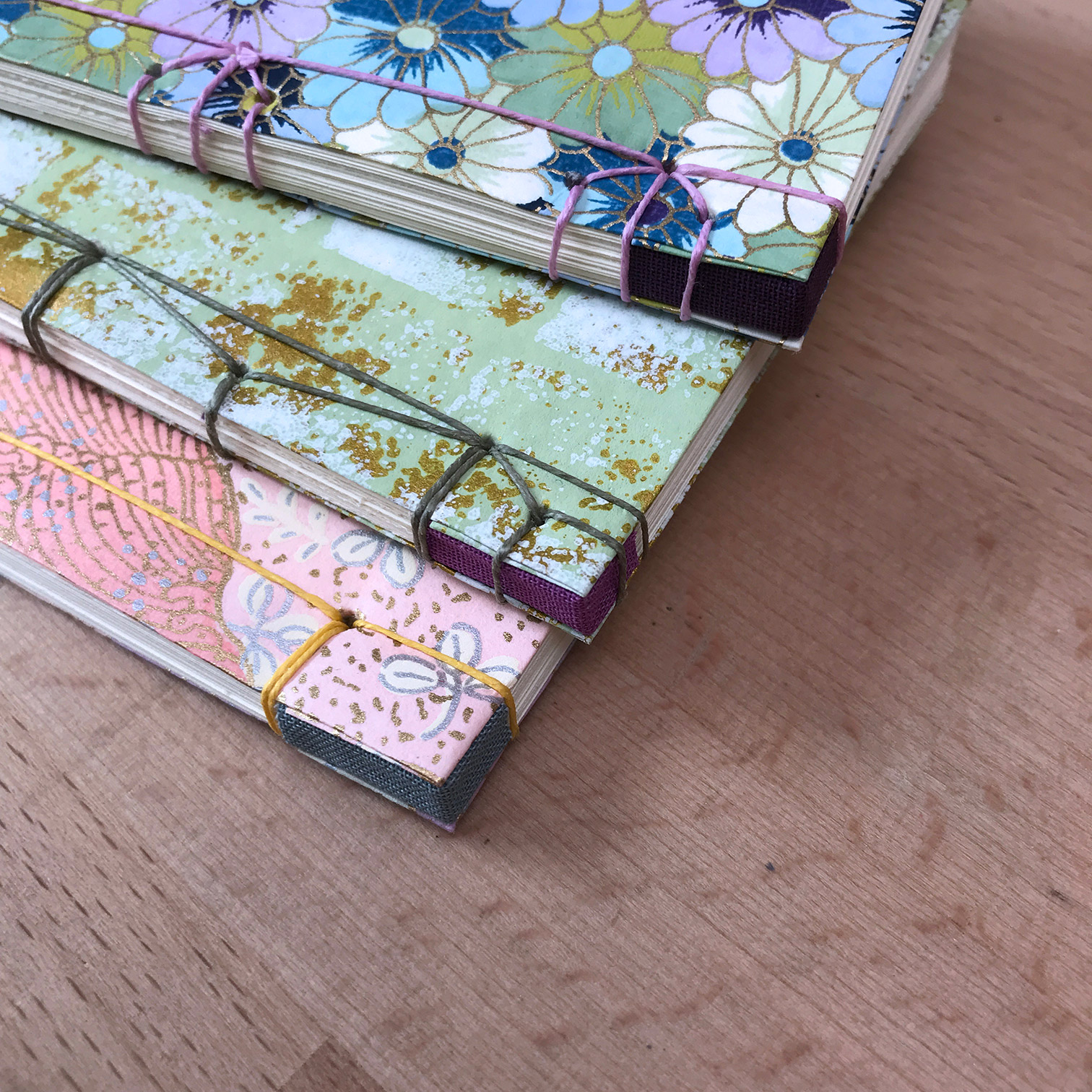 Close-up of Japanese Bindings sitting on a wooden cable.